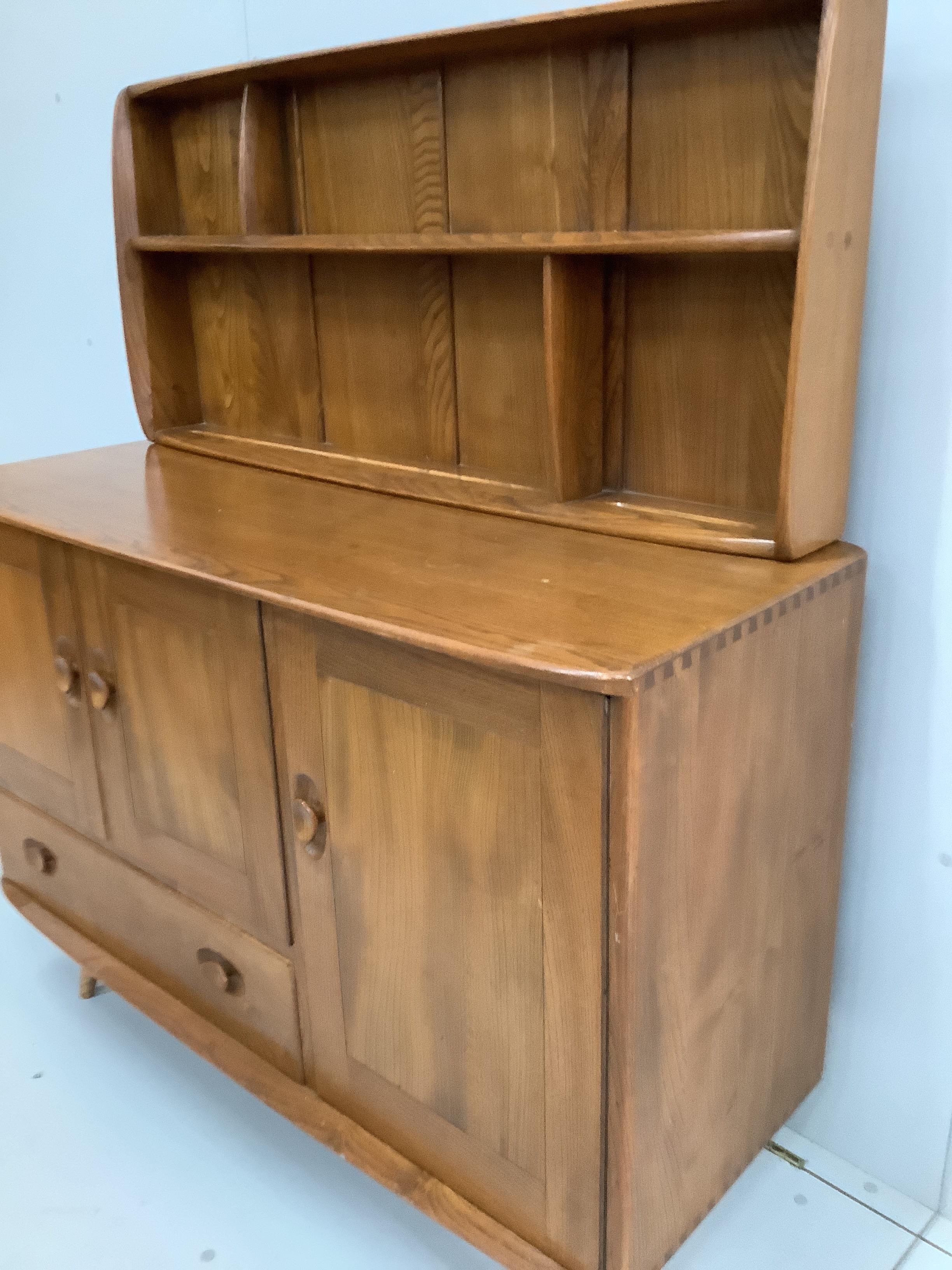 An Ercol Windsor elm sideboard with plate rack, width 114cm, depth 44cm, height including rack 130cm